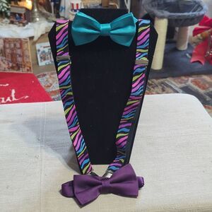 set of novelty suspenders w 2 bow ties, specifically featuring a colorful zebra